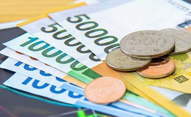 Biểu đồ chứng khoán và cờ Hàn Quốc, minh họa sự biến động của thị trường khi đầu tư cổ phiếu hoặc trái phiếu các công ty Hàn Quốc.